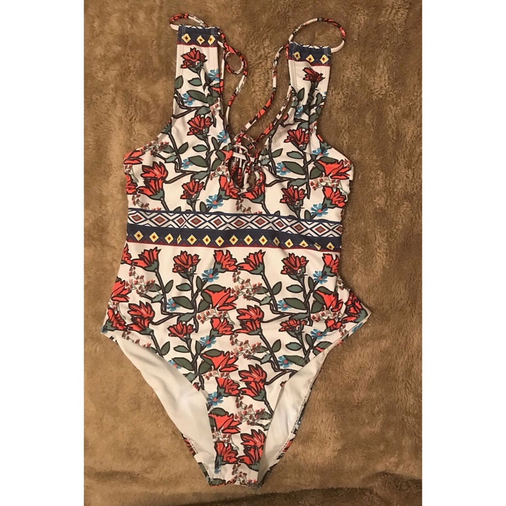 Floral patterned one piece suit